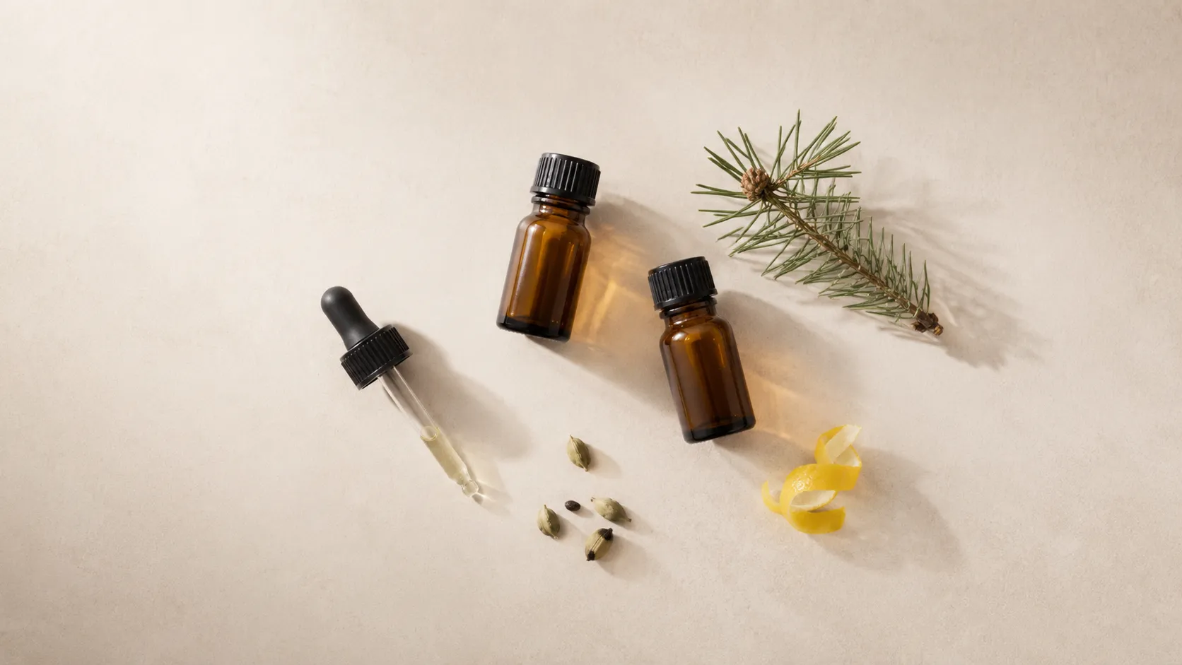 Recreate a Terpene Flavour Profile: Match, Improve, Replace 3 Flat-lay of custom terpene blends for brands: amber bottles, pipette, cardamom, pine and lemon peel on a neutral surface