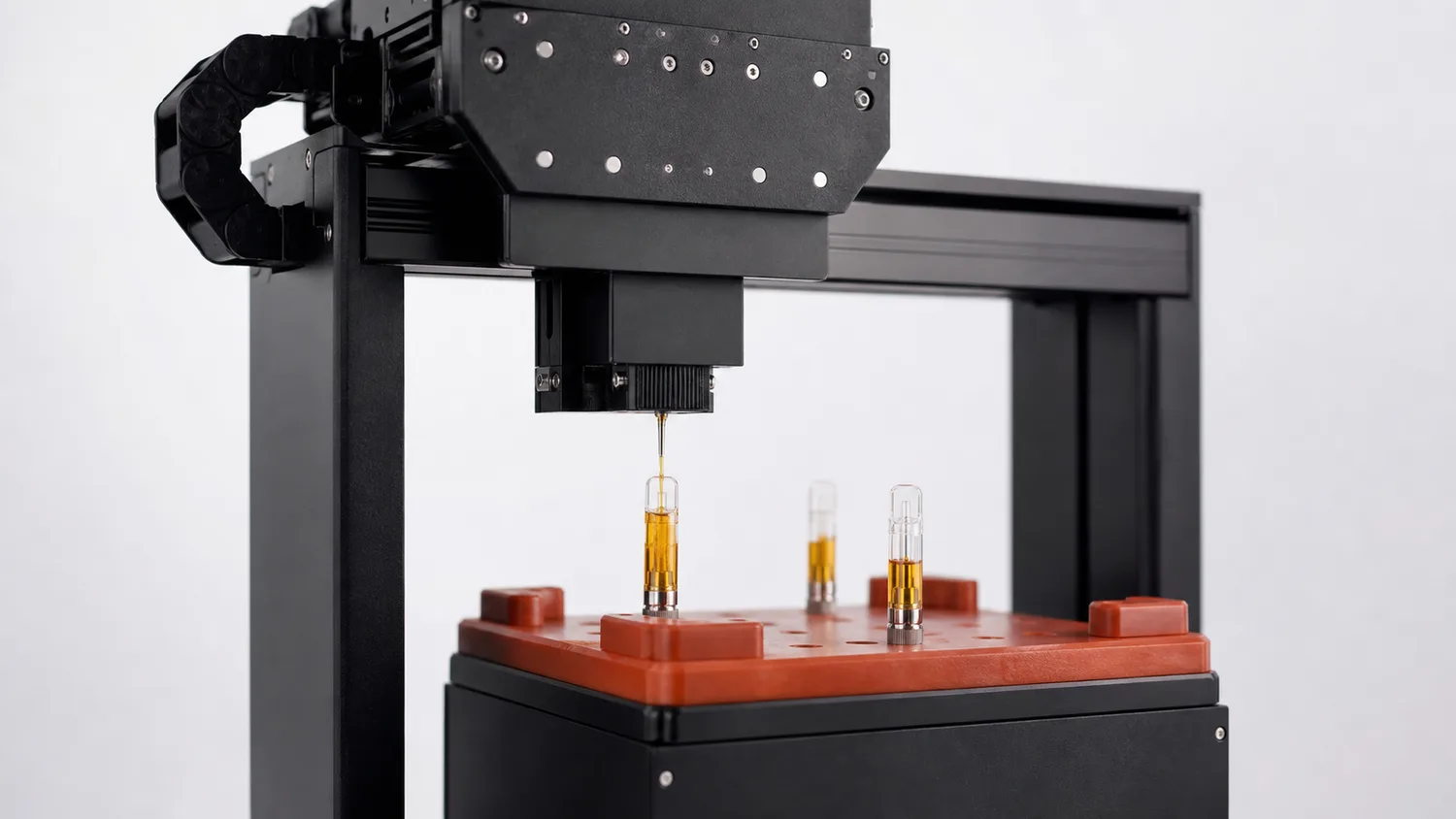 CBD Oil Vape Cartridge Filling and Capping Machine: Buyer Checklist for Brands 2 Vape cartridge filling machine dosing head precisely filling 510-thread cartridges with golden CBD oil